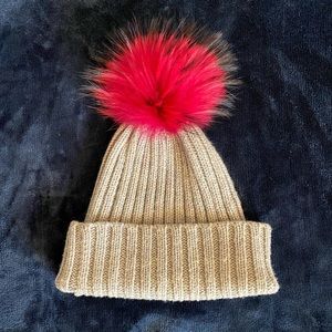 Very warm and cozy hat with the real fur
